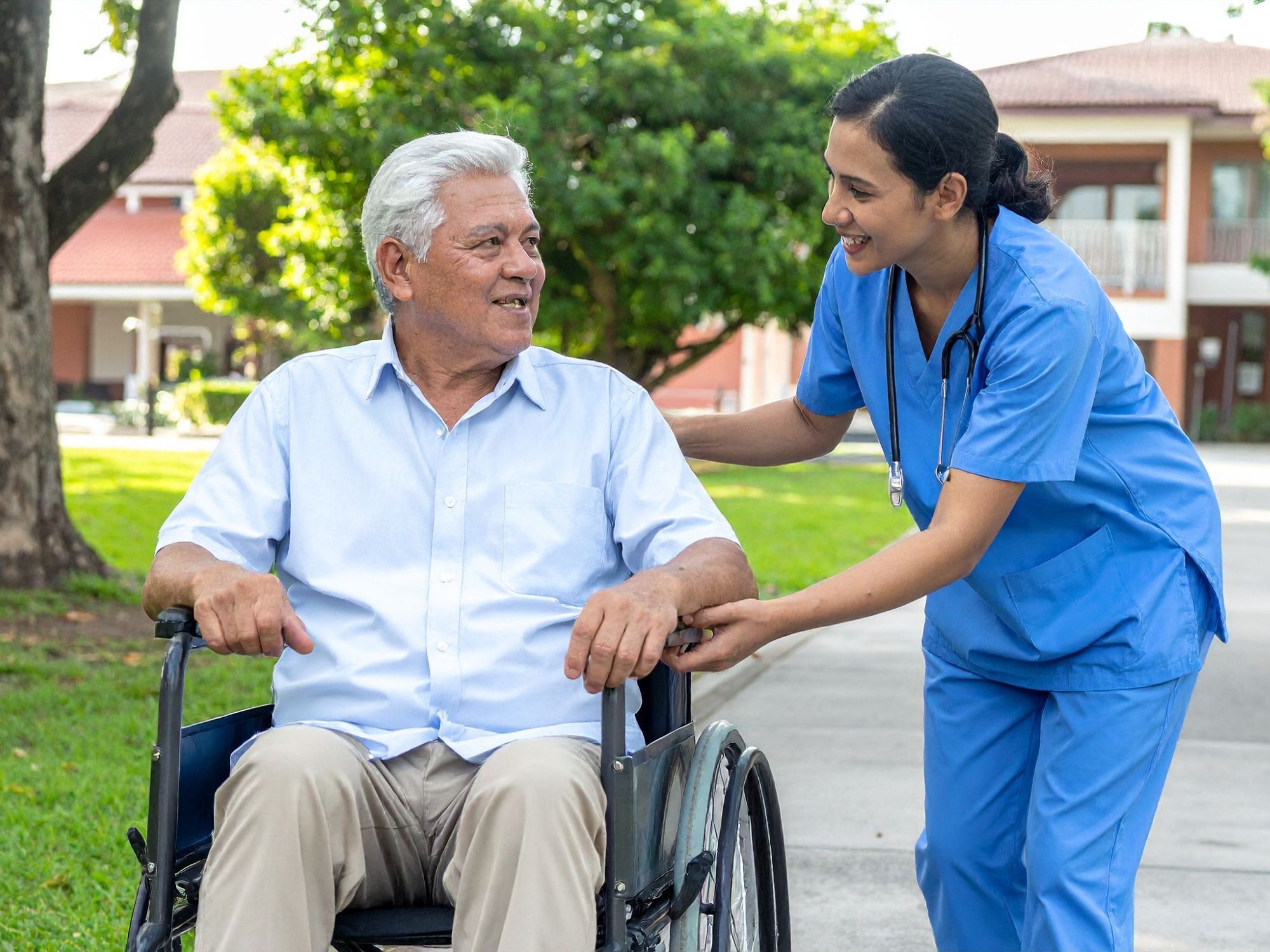 Senior living caregiver with resident